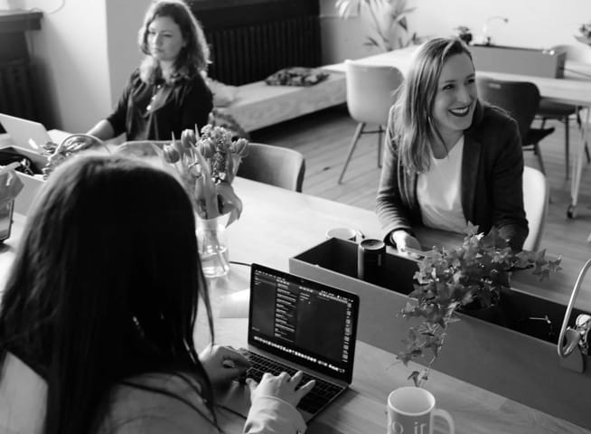 Three woman working in the office